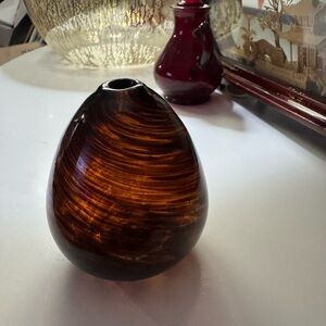 Hand blown brown swirl bud vase. 3 1/2 inches tall